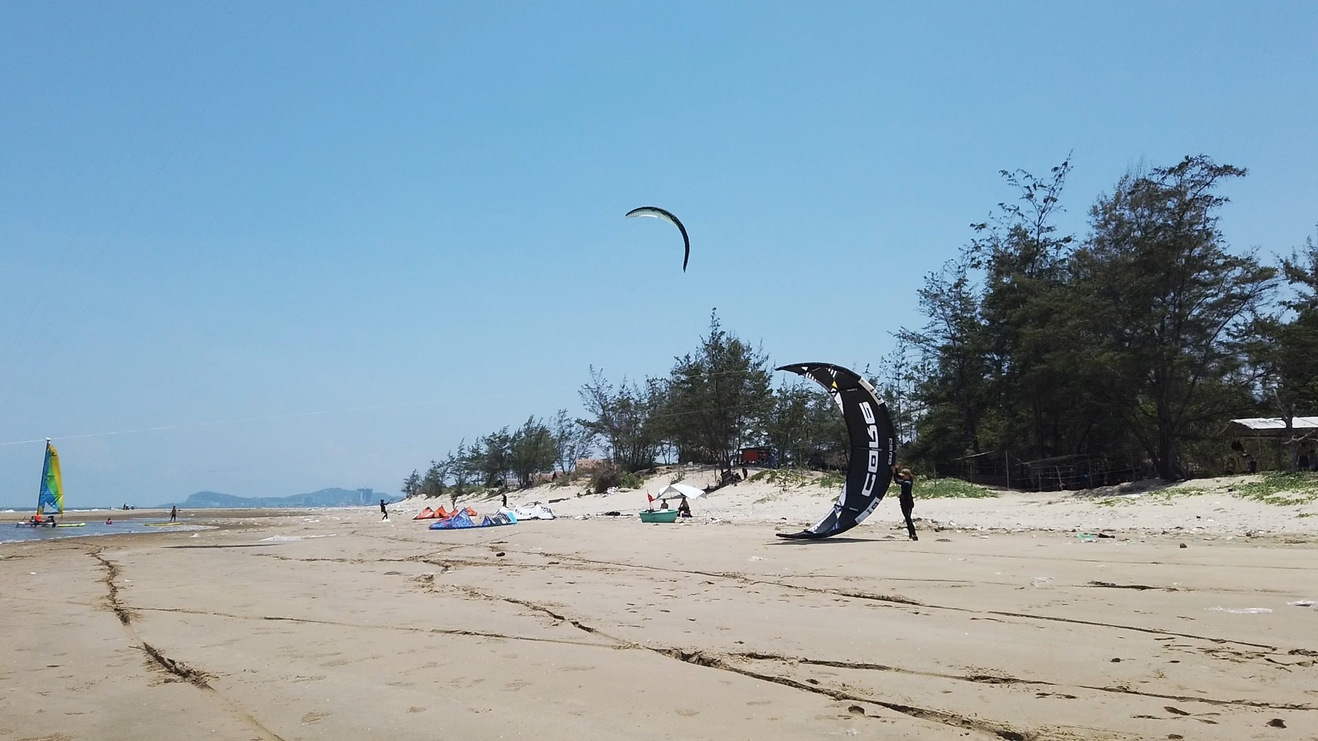 Doi Nhai Beach's crystal-clear waters and pristine flat sand with minimal development maintaining natural beauty 